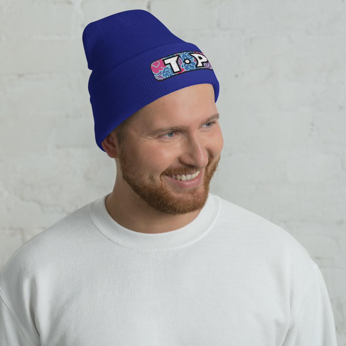 Top Cuffed Beanie featuring original Smutpop artwork